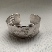 Cristol Johnson - "Napalm Cuff” – https://www.amazon.com/dp/B095XH7TZT?ref=myi_title_dp