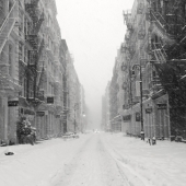 The streets of SoHo were quiet as people stayed in during NYC blizzard, Jonas. Roads and walkways were filled with piles of snow as weather increased into the evening.