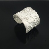 Jo Ann Graham - “Fine silver chassed and repousse Ginkgo leaf cuff” – www.jagcollections.com